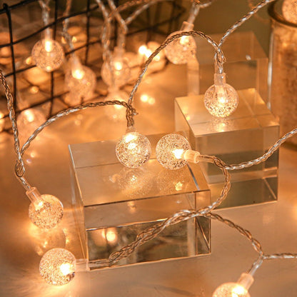 Kristall Lichterkette LED in einem Wohnzimmer-Setting für eine gemütliche Atmosphäre.