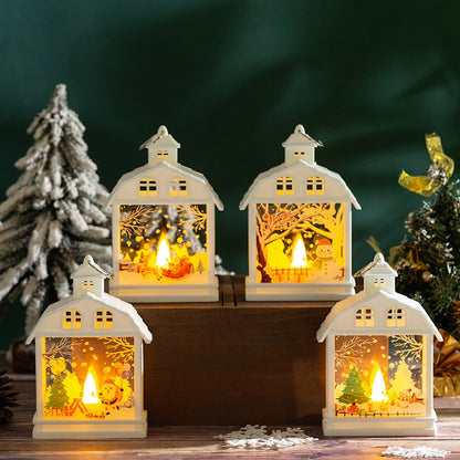 Weisse Weihnachtslaternen mit verschiedenen Motiven auf Holzpodesten