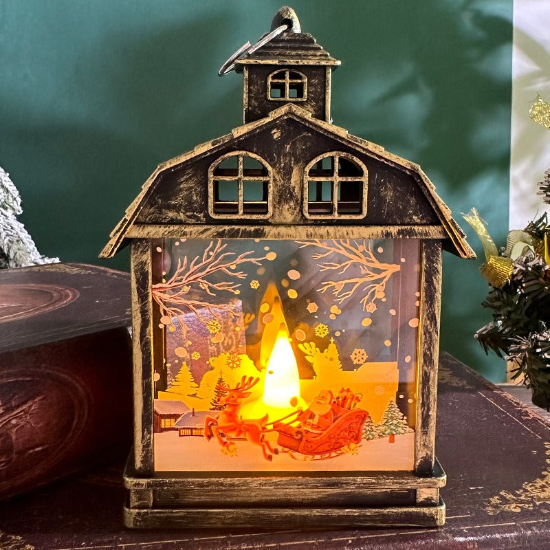 Bronzefarbene Weihnachtslaterne mit Rentier und Schlitten, beleuchtet