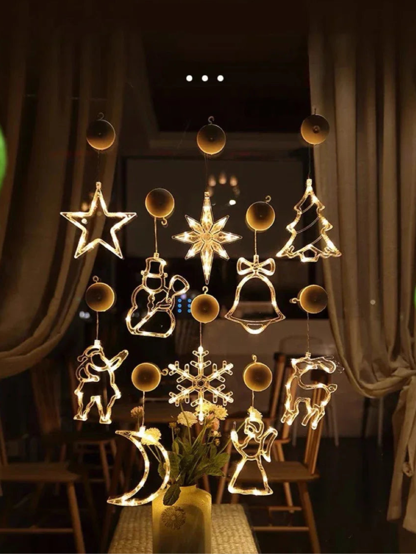 Warmweisse LED Fensterlichter mit Stern, Glocke, Engel und Weihnachtsbaum